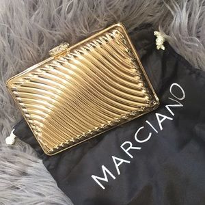 Used once authentic Marciano clutch